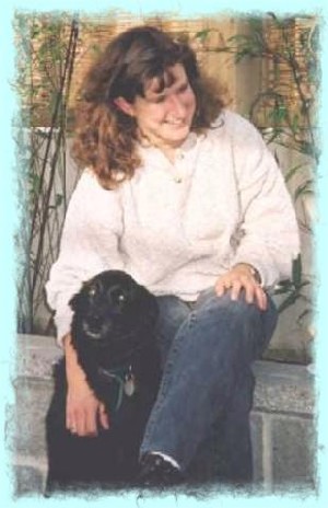 Picture of Rachel with her parent's dog "Sasha"